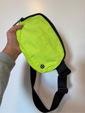 lululemon athletica Neon Yellow Sling Belt Bag with Black Strap